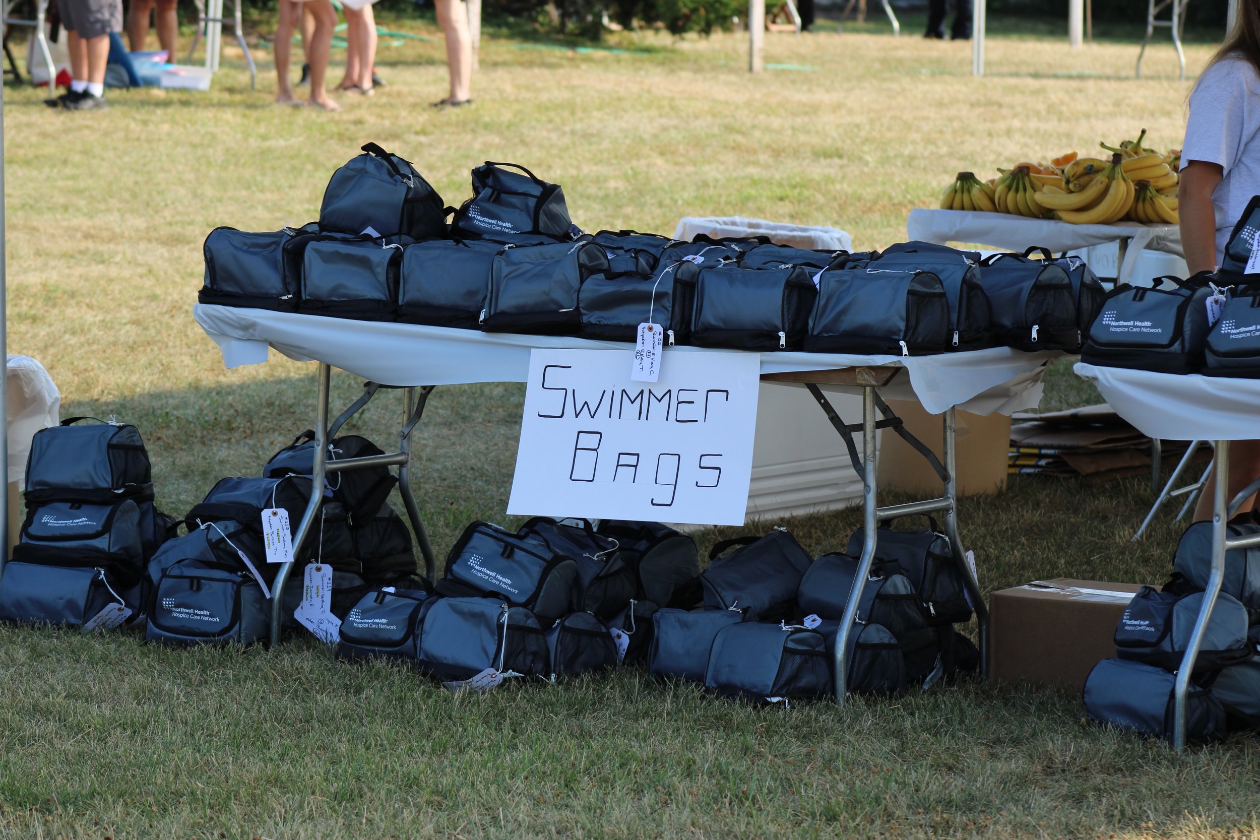 SWAG: Each finisher receives a bag stocked with post-swim necessities.