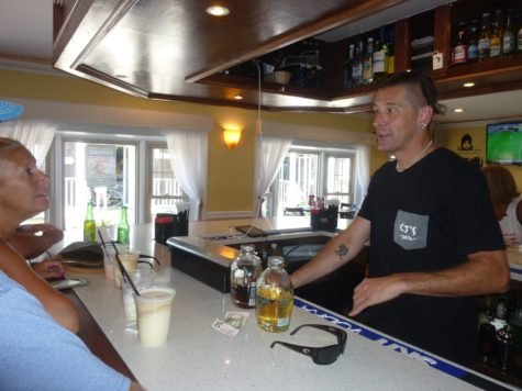Rob Webber serving up Pappa's Pilar rum in CJ's