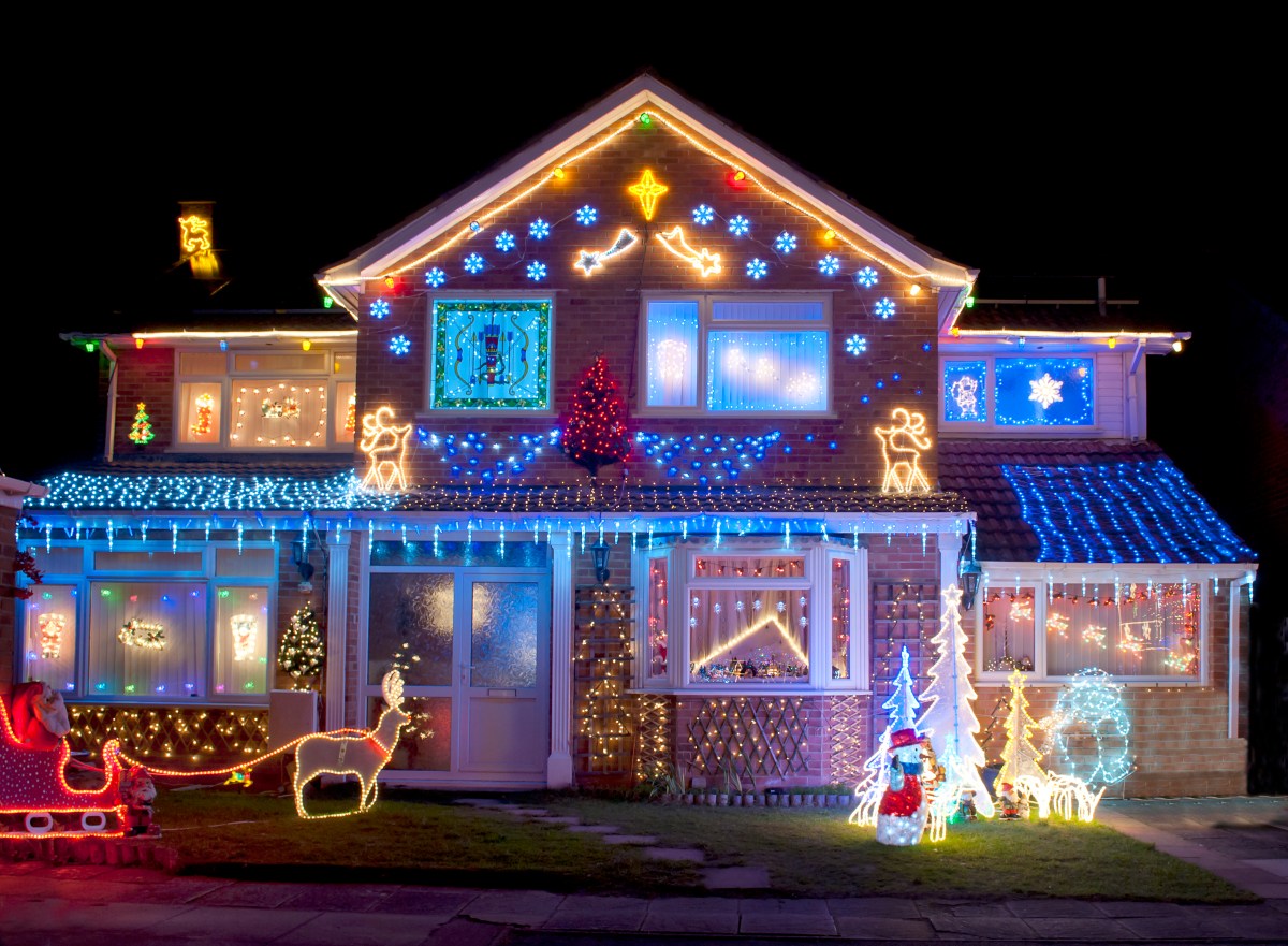 House colorfully decorated with bright Christmas lights